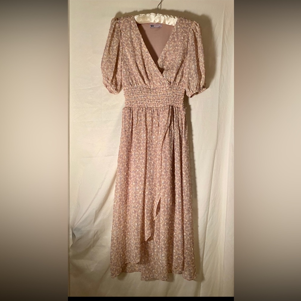 Medium mid length dress with short sleeves. Light pink. Never worn